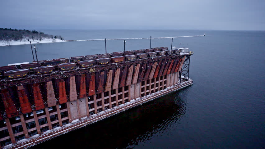 Industrial ore dock on the rugged shoreline of Lake Superior in Michigan.