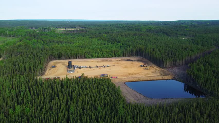 Summer View of a Drilling Rig in the Wilderness