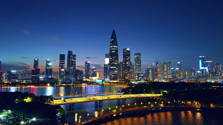 Aerial view of Shenzhen (Shenzhen, Guangdong Province), China, during the golden hour, with beautiful lighting, sunset, Shenzhen Bay, Nanshan District.