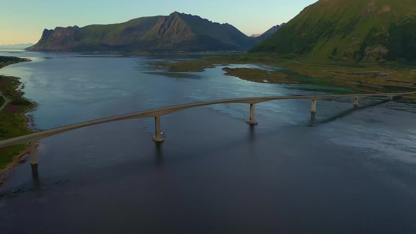 Gimsøystraumen Bridge at Dusk: A Serene View of the Bridge and Fjord