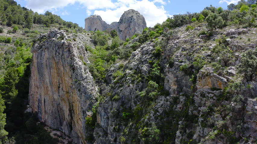 Bird view of granite mountais and Mediterranean pine forests, in the area of La Marina Alta, Alicante, Spain. 