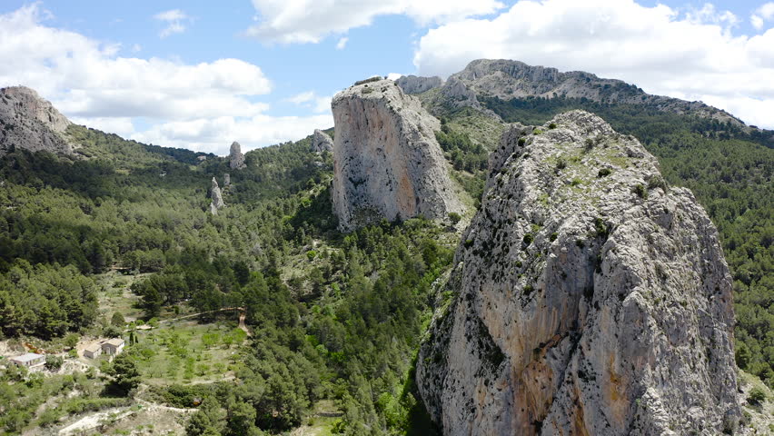 Bird view of granite mountais and Mediterranean pine forests, in the area of La Marina Alta, Alicante, Spain. 