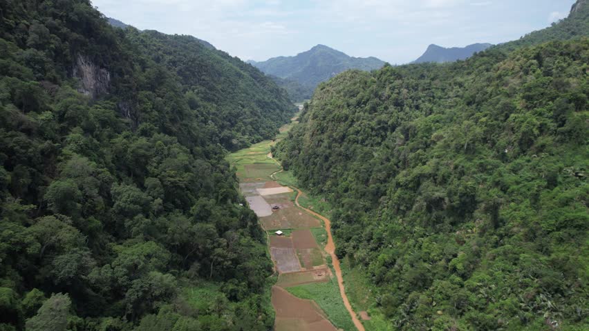 Majestic mountain landscape in Vietnam with lush green forests, rolling hills, and breathtaking natural scenery