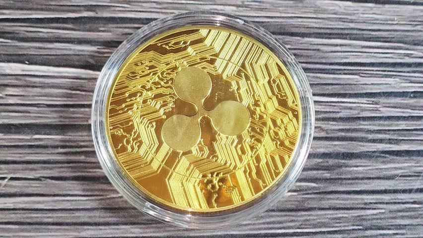 Obverse of Physical Ripple XRP, the native cryptocurrency of the XRP Ledger (XRPL), an open-source, decentralized blockchain technology, designed to facilitate fast cross-border payments