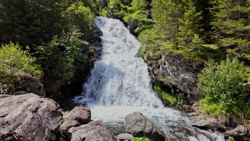 Scenery waterfall route. Nature mountain landscape. Waterfall landscape. Nature wildness. Rapid waterfall travel destination. Picturesque waterfall. Travel destination