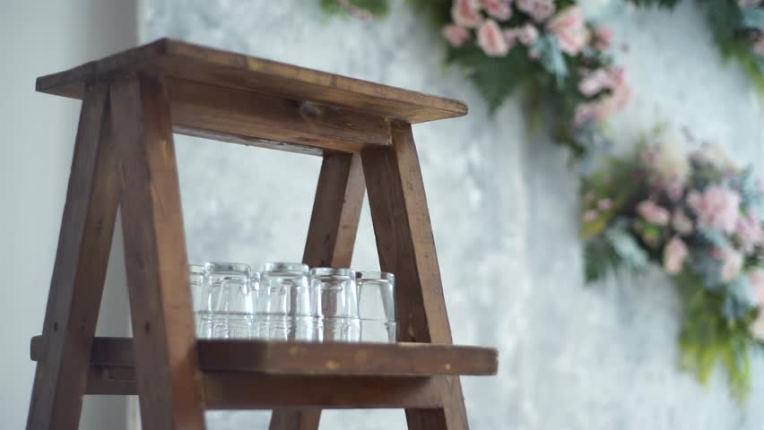 Close-up shot of a food stall counter and catering station with various snacks and meals setup for an event or festival.