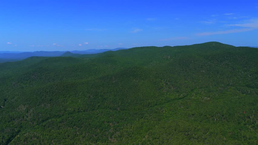 Adirondack Mountains of Lake George Up State New York aerial drone Town of Lake George landscape spring summer sunny morning blue sky clouds hazehiking trails Jimmy