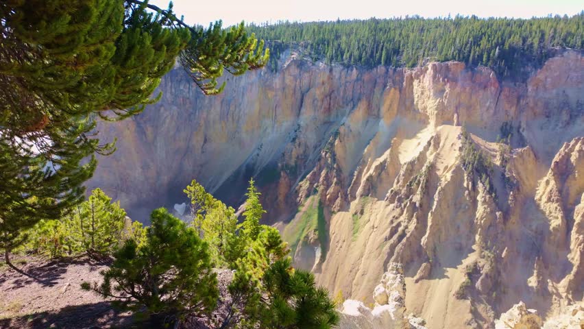 A sweeping aerial style view from South Rim Trail overlooks the Grand Canyon of the Yellowstone in Yellowstone National Park