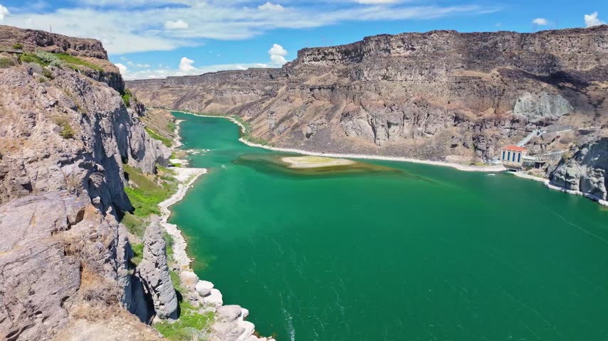 Powerful Shoshone Falls cascading dramatically over the rocky canyon walls in Twin Falls Idaho