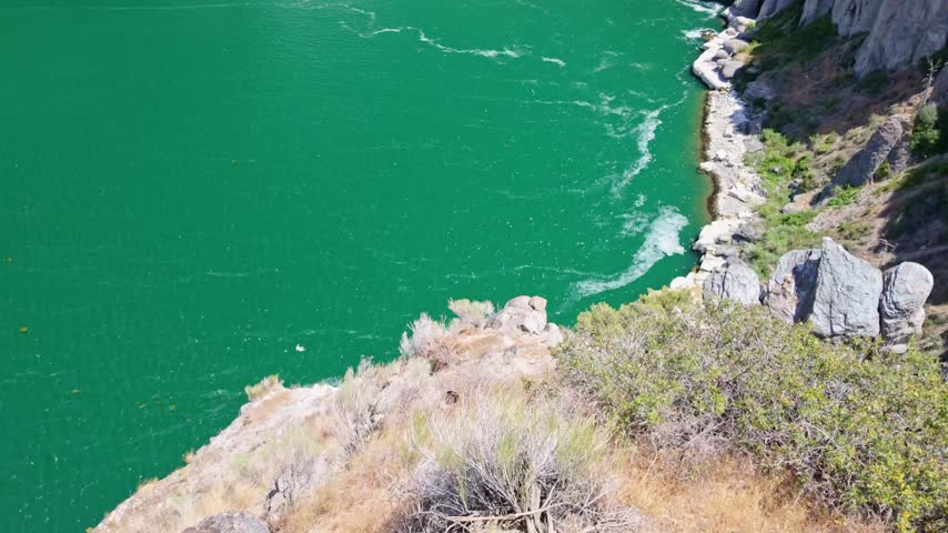 Powerful Shoshone Falls cascading dramatically over the rocky canyon walls in Twin Falls Idaho