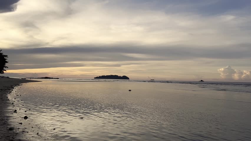 Scenic Sunset Over Tropical Ocean Coast