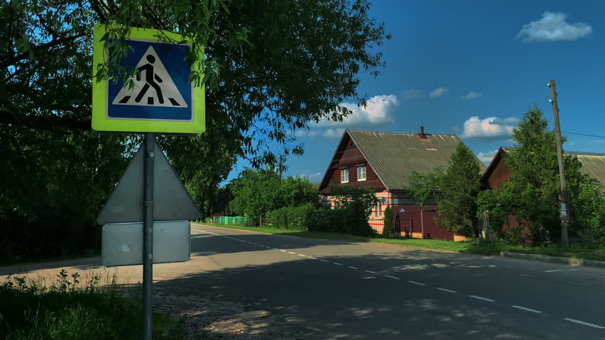 Old traditional rural wooden house in a russian village from the kingdom time. Cross walk.