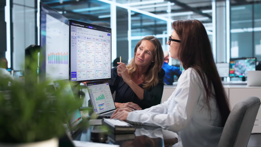 The Woman Uses Strategic Scoring Matrix To Evaluate Vendor Bids Carefully.