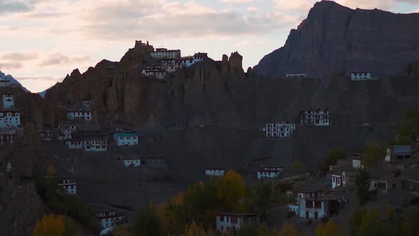 Sunset clouds over Dhankar monastery at Spiti Valley, Himachal Pradesh, India. Dramatic natural landscape of Spiti Valley. Buddhist landmark on the top of the mountains. Travel and holidays concept.