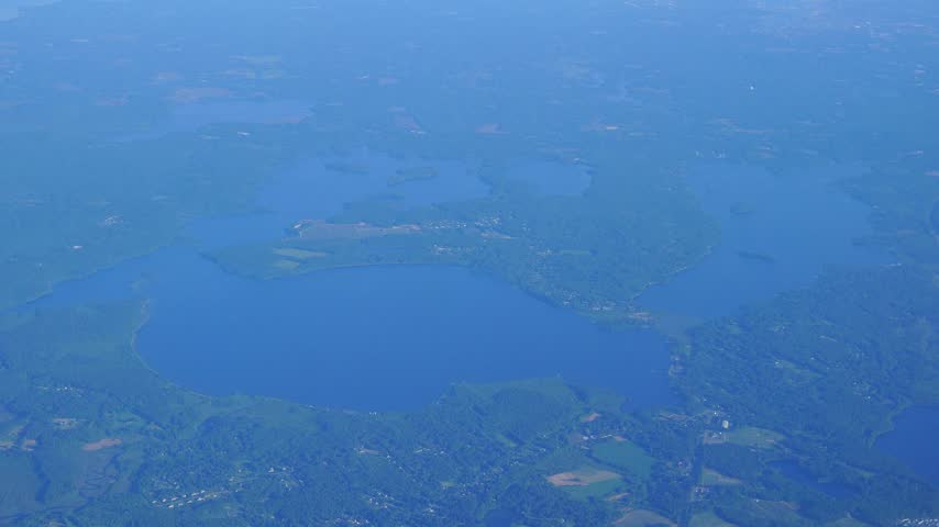 The selected region features Assawompset Pond, located in southeastern Massachusetts.Location: It sits roughly 40 miles south of Boston, overlapping the towns of Lakeville and Middleborough.Fun Fact: It is the largest natural lake in the state of Massachusetts. From an aerial view, its distinct shoreline shape is often compared to a whale or a duck.