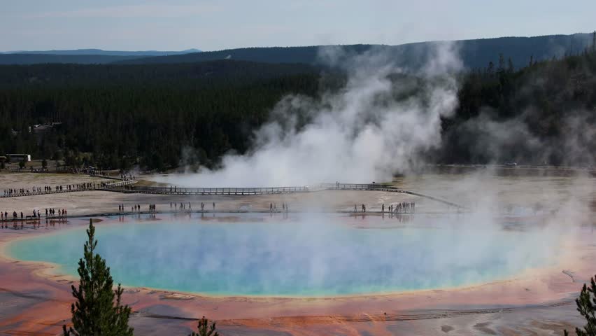 Geothermal activity in Yellowstone National Park including grand prismatic spring and other features