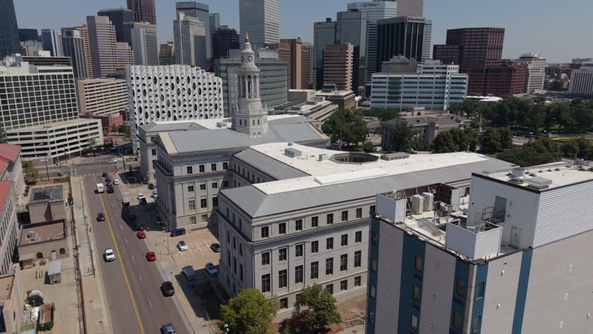 flying over Denver City Hall toward downtown skyline