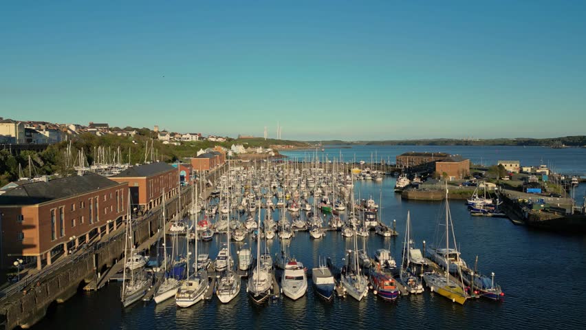 Aerial video Milford Haven Marina Wales UK. Milford Haven mouth of the two rivers Cleddau