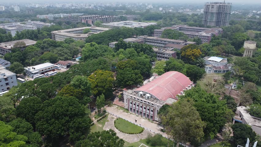 Aerial view of sprawling university campus and buildings among trees landscape education institution greenery city landscape education institution greenery city
