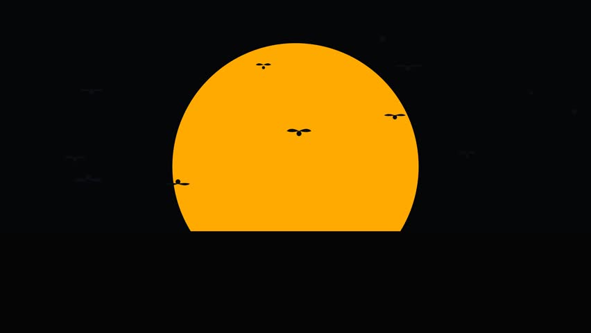 Large orange sun setting over dark horizon. Minimalist sunset with birds flying in sky.