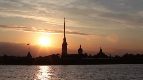 Silhouette of the Peter and Paul Fortress in sunset lights. Saint-Petersburg, Russia
