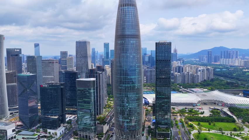China Greater Bay Area Guangdong Shenzhen Bay Qianhai Nanshan Houhai flight over Culture Park and Innovative enterprise headquarters showing rapid economic growth and urban skyline landscape