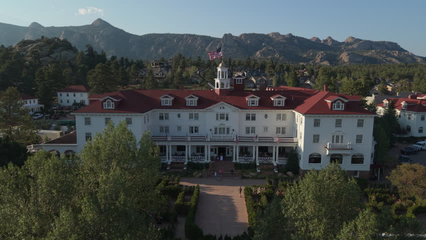 8-1-26, Estes Park, CO, USA - flying right view of landmark Stanley Hotel in Estes Park, CO