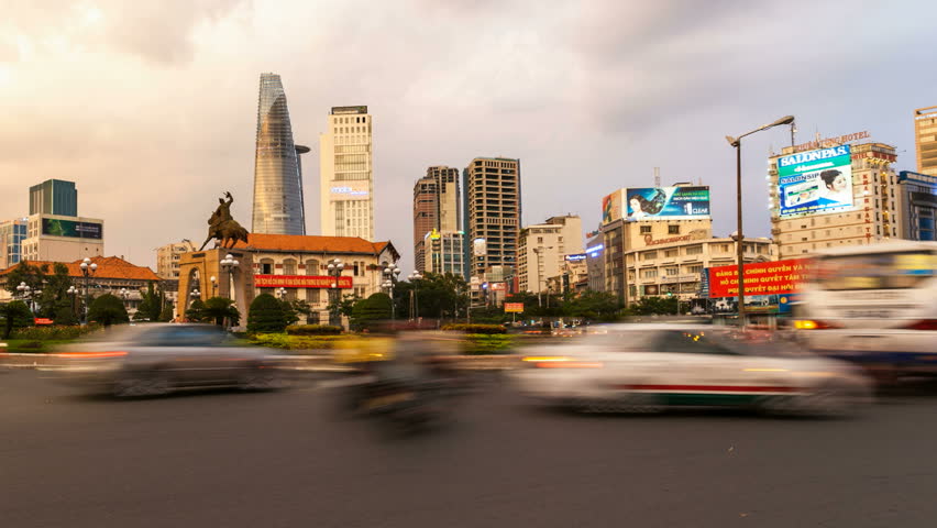 HO CHI MINH CITY - JUNE 9: Time lapse view of traffic in front of Ben Thanh