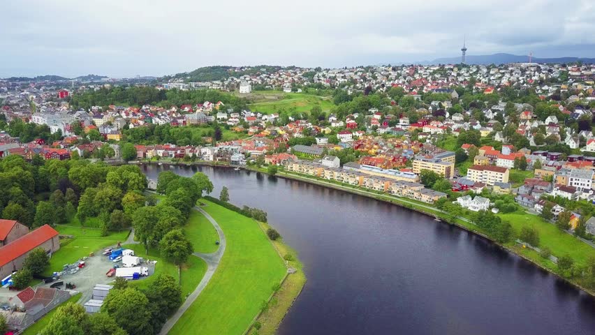 Nidelva river and Trondheim city aerial panoramic view. Trondheim is the third most populous municipality in Norway.