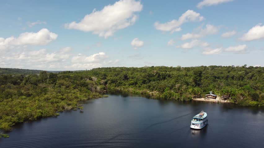 Regional Boat on the Rio Negro Surrounded by the Amazon Rainforest, Brazil