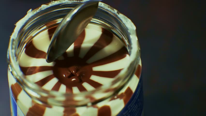 Tasty Chocolate Spread For Breakfast Toast. Nut Cream For Bread. Spoon Of Melted Chocolate Spread. Yummy Nut Paste Cacao Chocolate Cream Hazelnut Paste  Sandwich On Breakfast. Creamy Cacao Nut Spread