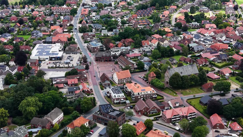 A panorama aerial view of the city Bockhorn above the old town on a cloudy summer noon in Germany