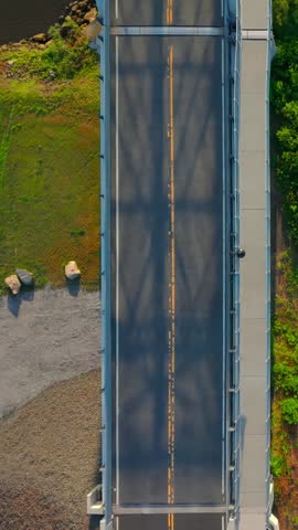 Summer aerial view featuring the East Haddam Swing Bridge along the Connecticut River in East Haddam, Connecticut just after sunrise