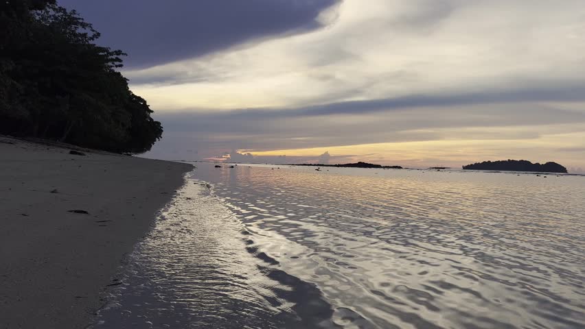 Sunset Over Tropical Beach Shoreline