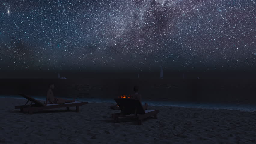 Couple Relaxing by a Beach Campfire Under the Stars