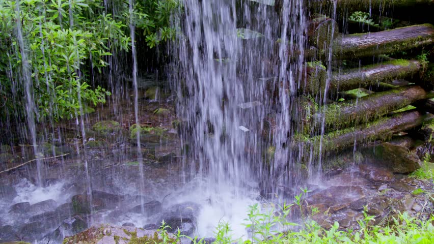 Water flowing at the Mingus Mill in the Great Smoky Mountains National Park in the summer with low stable shot.