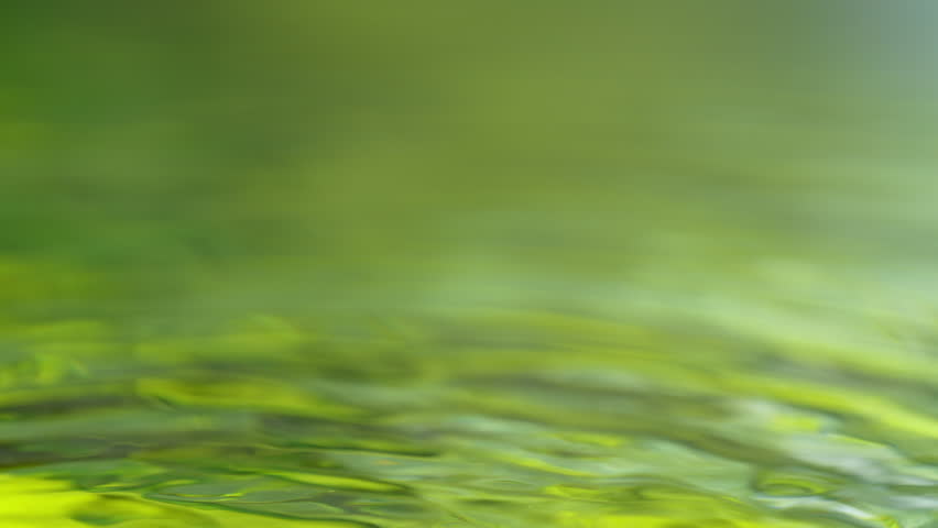 Super Slow Motion Shot of Fresh Raspberry Falling into Water and Making Splash at 1000fps.