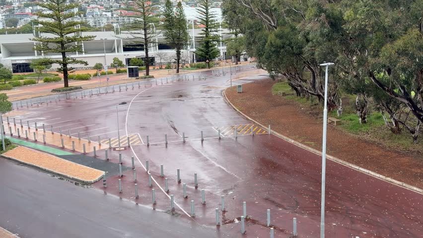 An empty wet street near Cape Town Stadium in Cape Town, South Africa.
