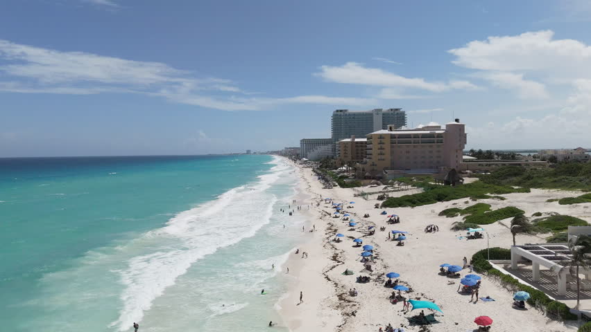 Aerial view of Cancun beach resort with tourists, Mexico