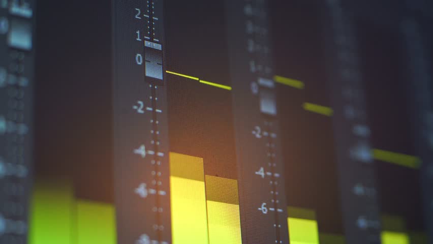 Close-up of a sound mixing board in a recording studio, highlighting audio control and technical precision.