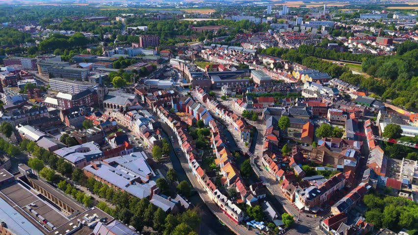 Amiens is a historic northern French city bisected by the Somme River, famous for its floating gardens, brick architecture, vibrant quarters, and rich medieval, industrial, and literary heritage.