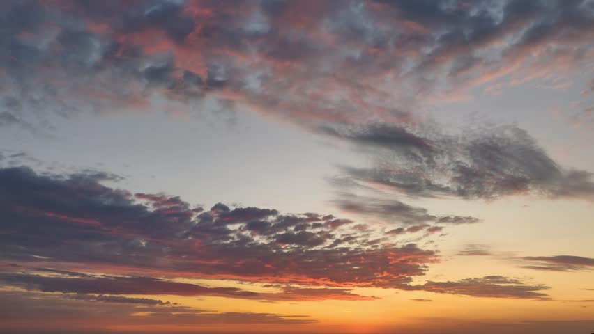 Epic sunset, beautiful orange sky with clouds over the sea