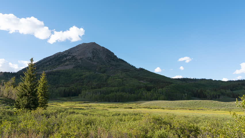 Static timelapse of Gothic Mountain near Crested Butte, Colorado as daylight fades into dusk.