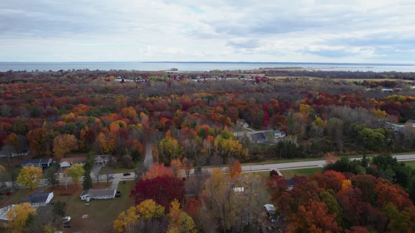 Long approach Lake Michigan Fall Colors Aerial Midwest Suamico Wisconsin Small Town Residential