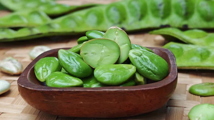 Peeled Stink Beans in Wooden Bowl 