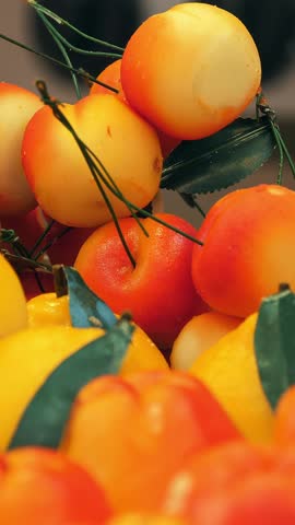 Fruit. close-up. cherries, lemons, plums, pears and other fruits are displayed on the counter. fresh fruit stand at the farmers market. Ripe juicy fruits in the store. showcase, market counter.