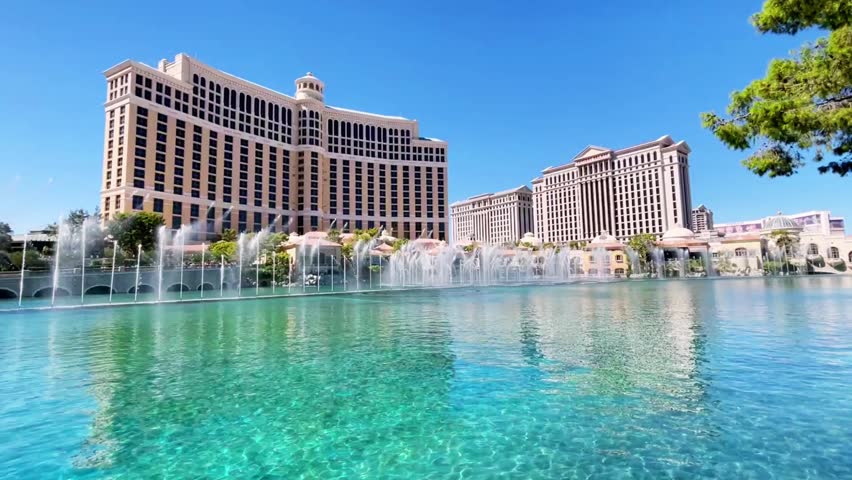 Architecture Bellagio and fountains, showcasing the iconic resort facade and spectacular water fountains in a vibrant urban setting.