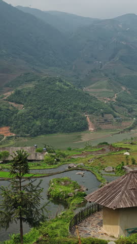 Aerial Drone View of Sa Pa Village Rice Terraces and Mountain Landscape Vietnam Vertical