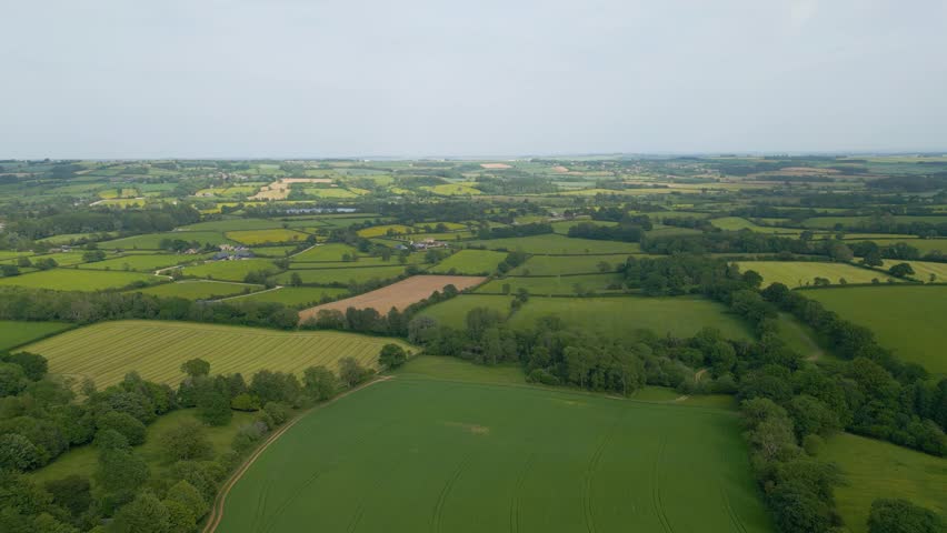 Scenic views of rolling farm fields in the Cotswolds near Bourton-on-the-Water, Gloucestershire, England