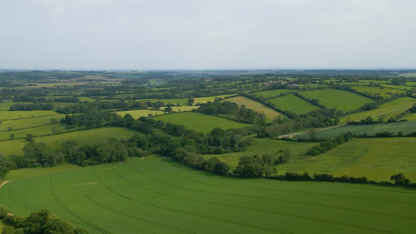 Scenic views of rolling farm fields in the Cotswolds near Bourton-on-the-Water, Gloucestershire, England